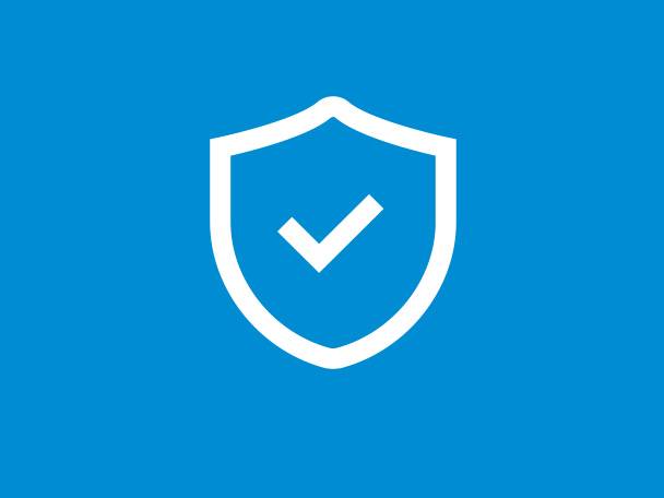 Ein weißes Schild mit einem Häkchen darauf, auf blauem Hintergrund.