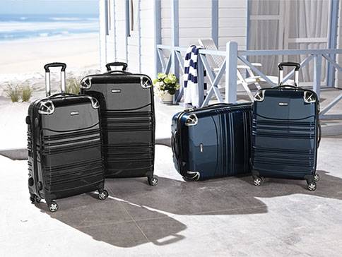 Koffer: schwarz und dunkelblau, Outdoor-Thema.